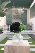 8 artificial black roses in Candelia vase Egypt