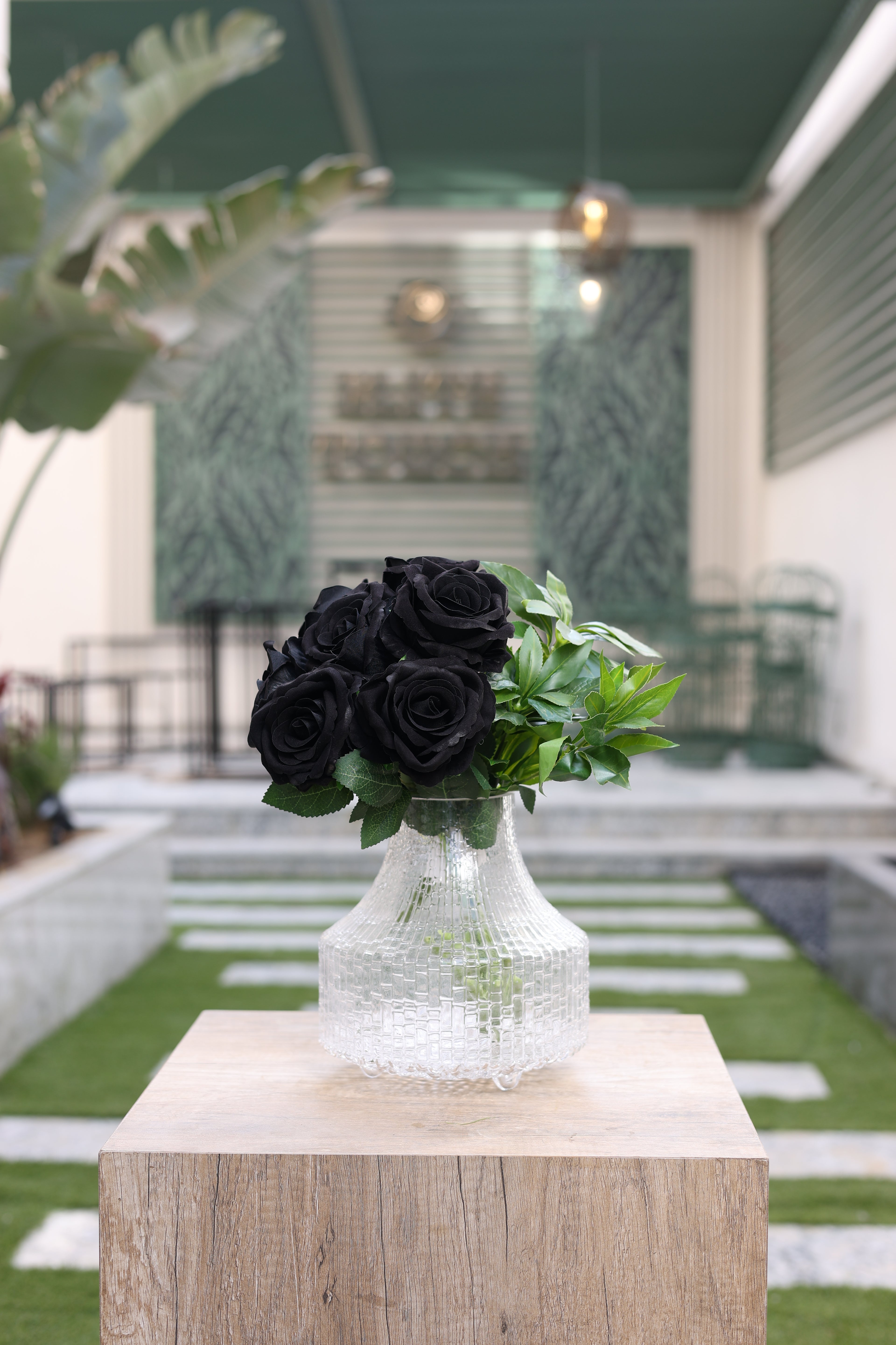 8 artificial black roses in Candelia vase Egypt