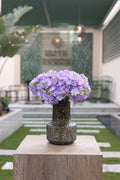 purple artificial Ortancia flowers in Fade Nova vase Egypt