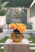 orange yellow artificial Clematis flowers in S-Tone vase Egypt