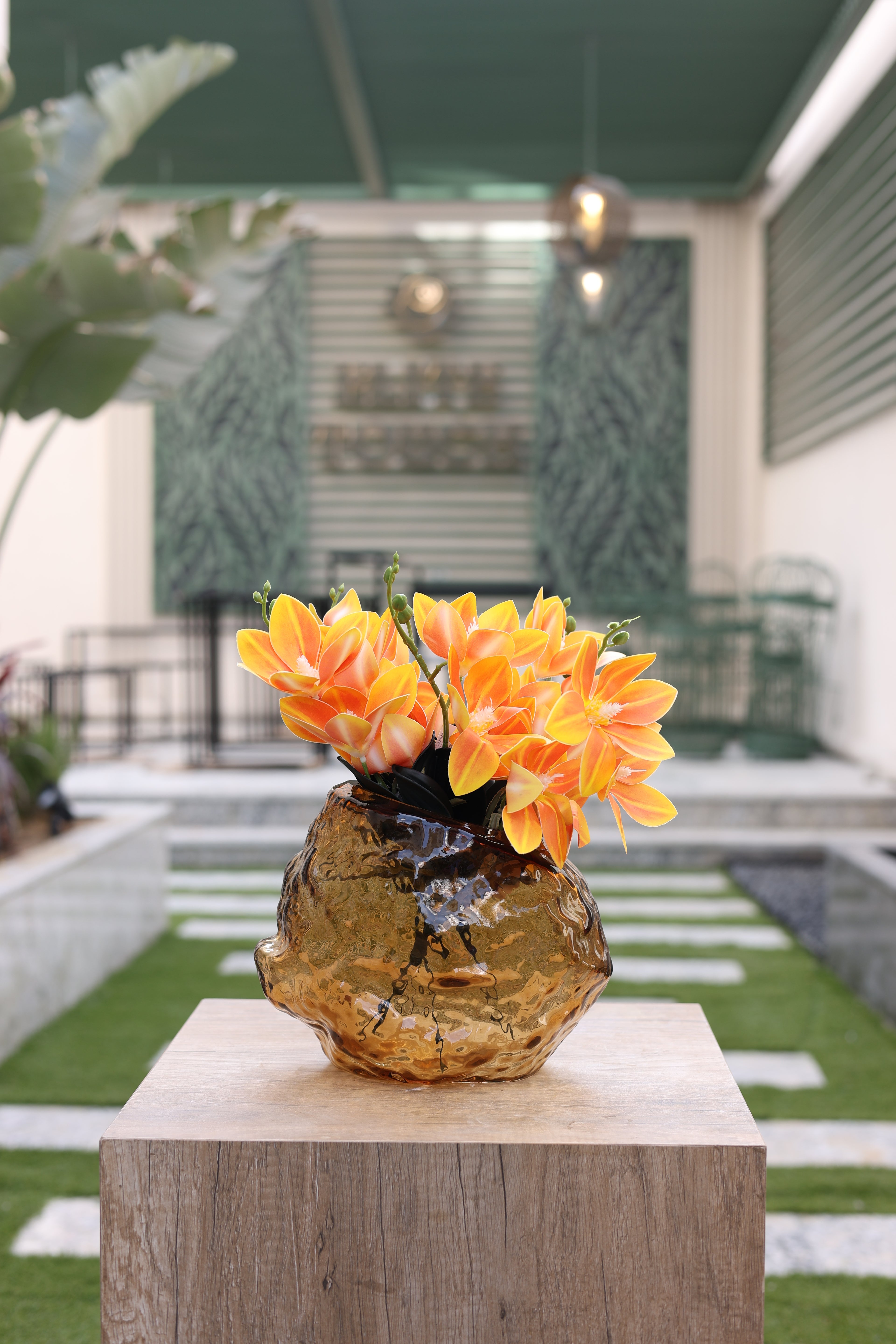 orange yellow artificial Clematis flowers in S-Tone vase Egypt