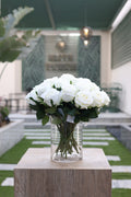 white artificial roses in Limaire vase Egypt