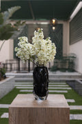 white artificial jasmine flowers in Noir vase Egypt