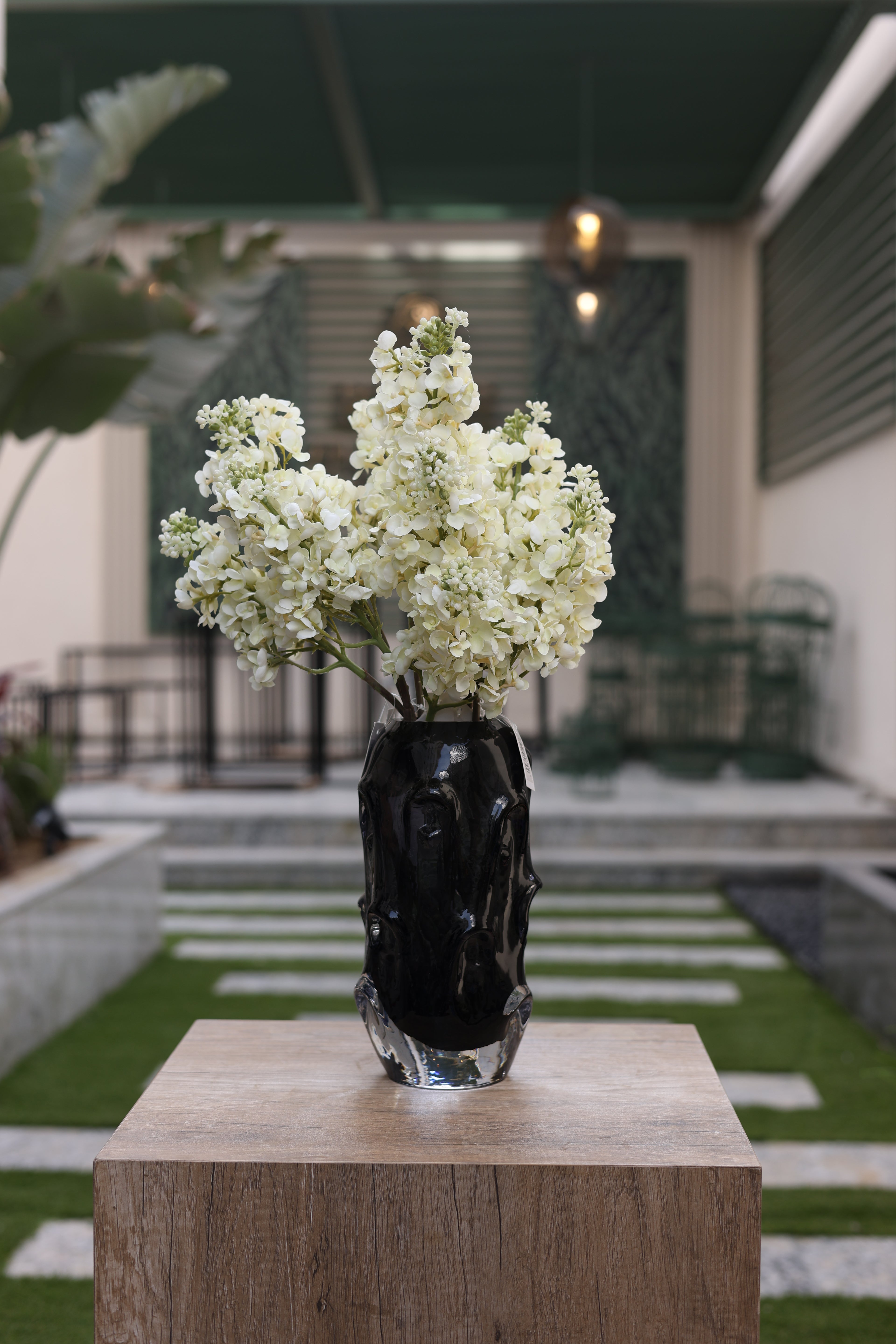 white artificial jasmine flowers in Noir vase Egypt