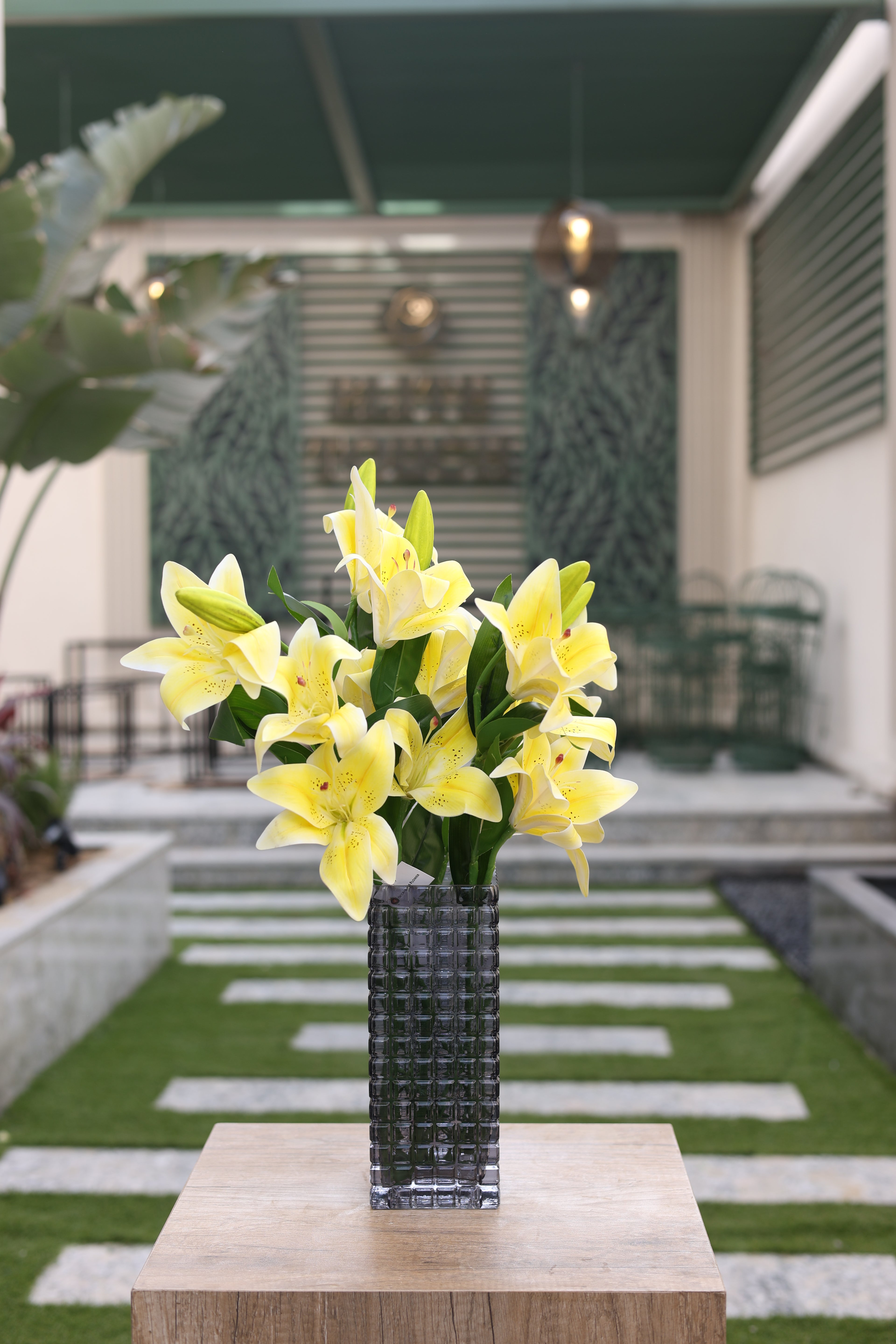 yellow artificial lilies in Scaper vase Egypt