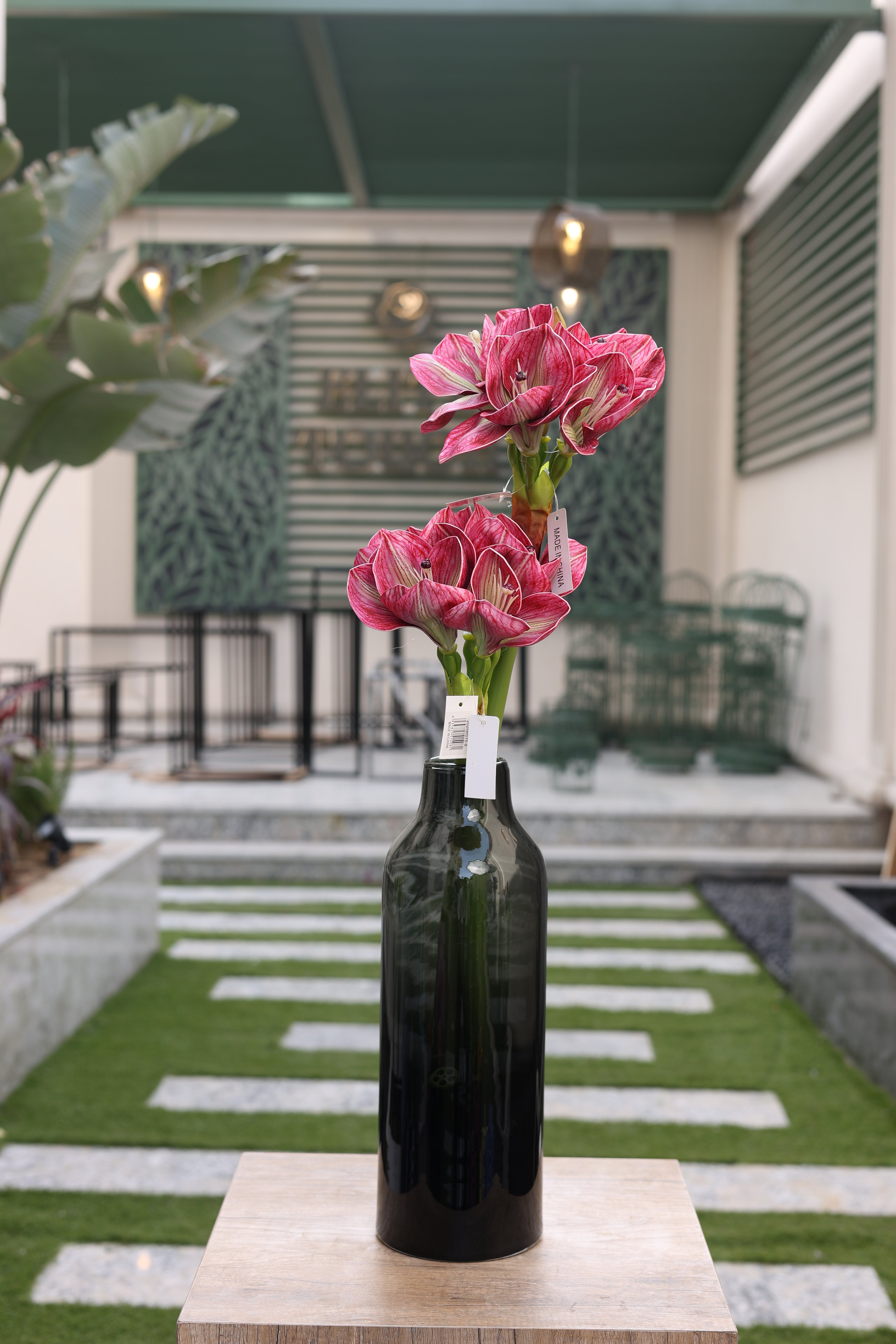 hot pink artificial amaryllis 2 stem in glass vase Egypt