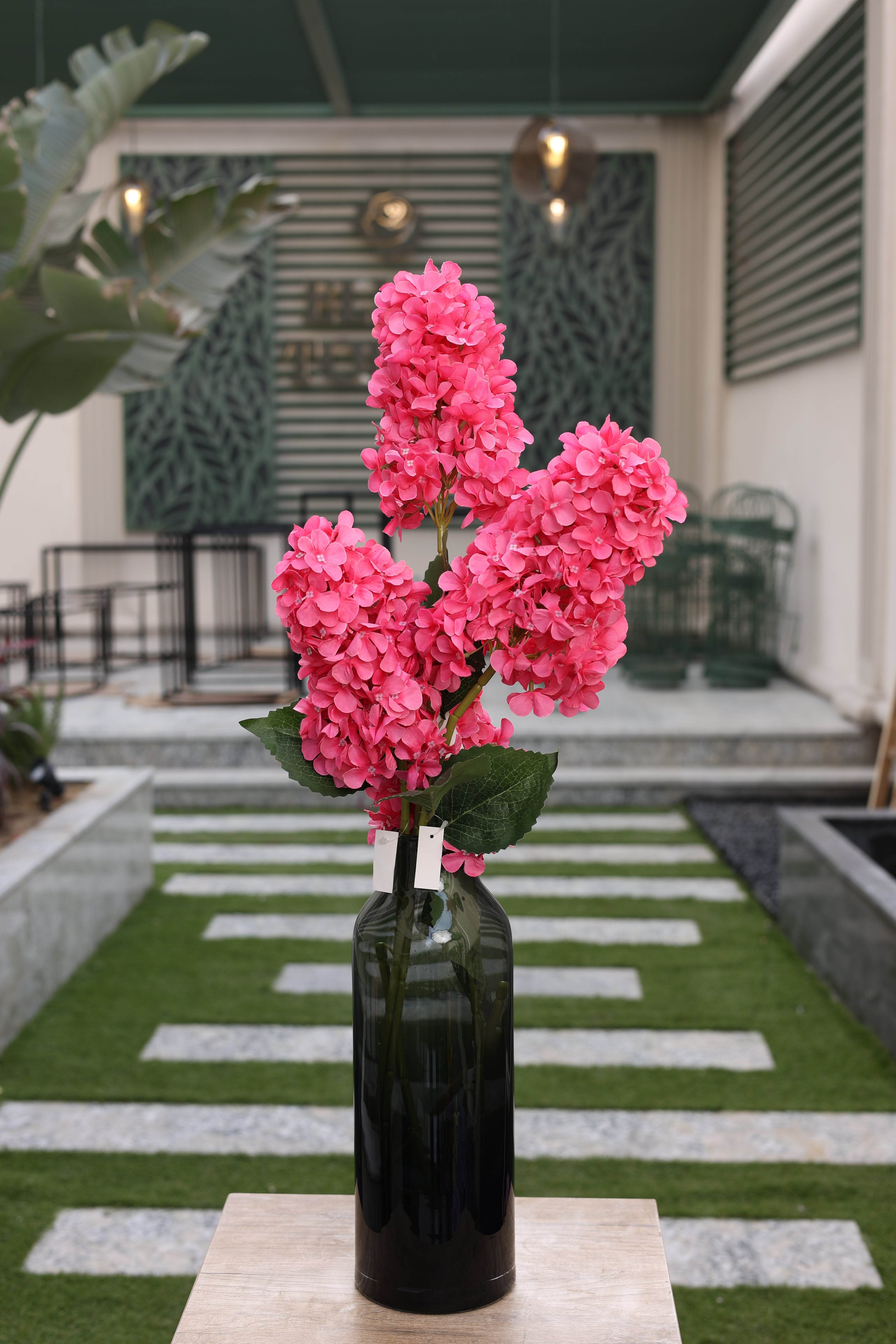 hot pink artificial Anterina 3 stem in glass vase Egypt