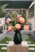 pink artificial ranunculus 9 stem in glass vase Egypt