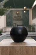 minimalist circular black vase Egypt