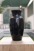 Premium black decorative vase displayed in a luxury modern Egyptian interior.