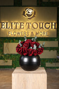 red artificial flowers in glass vase Egypt