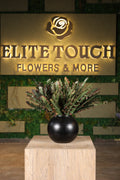 medium artificial green foliage in glass vase Egypt