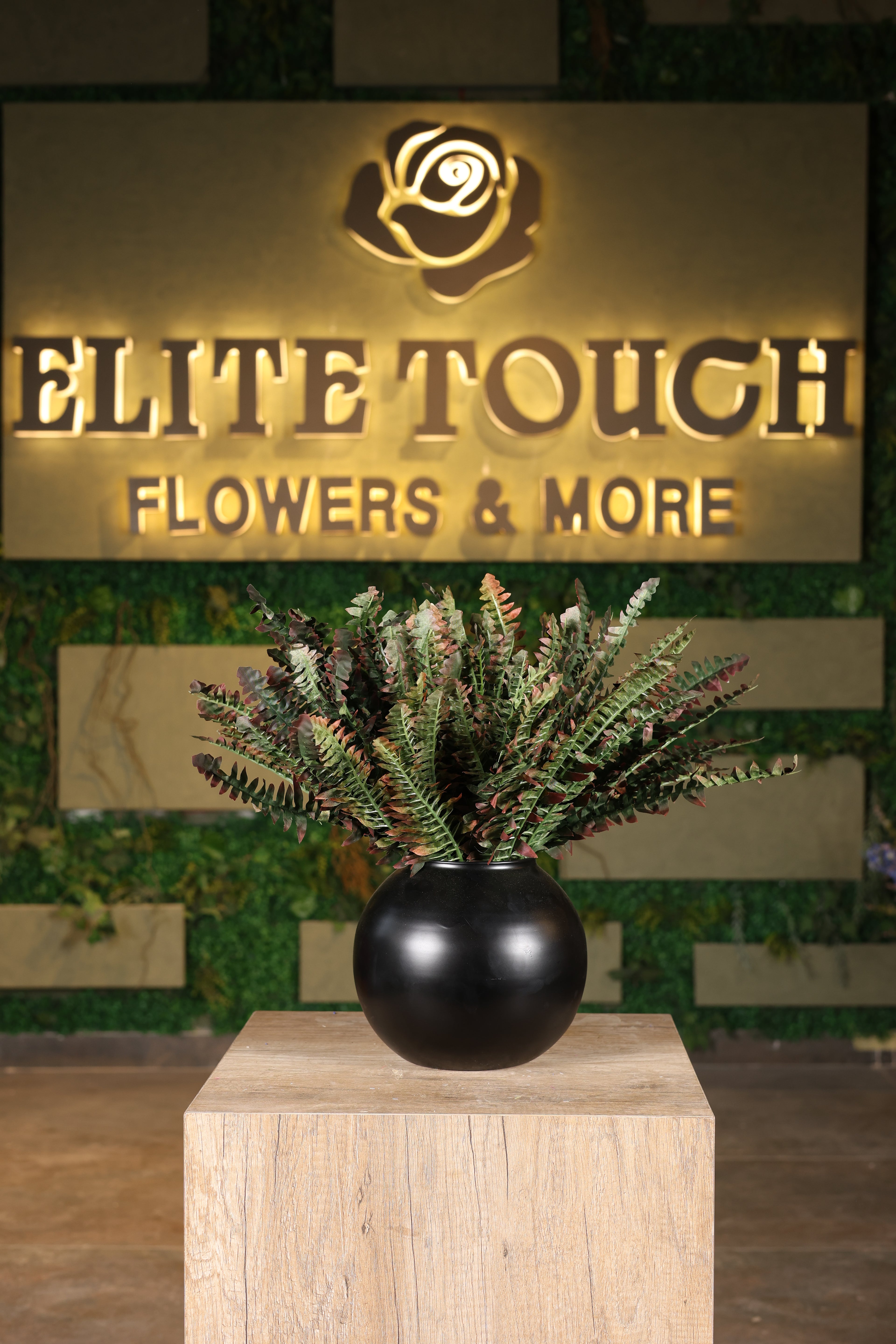 medium artificial green foliage in glass vase Egypt