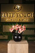 large artificial orchid in glass vase Egypt