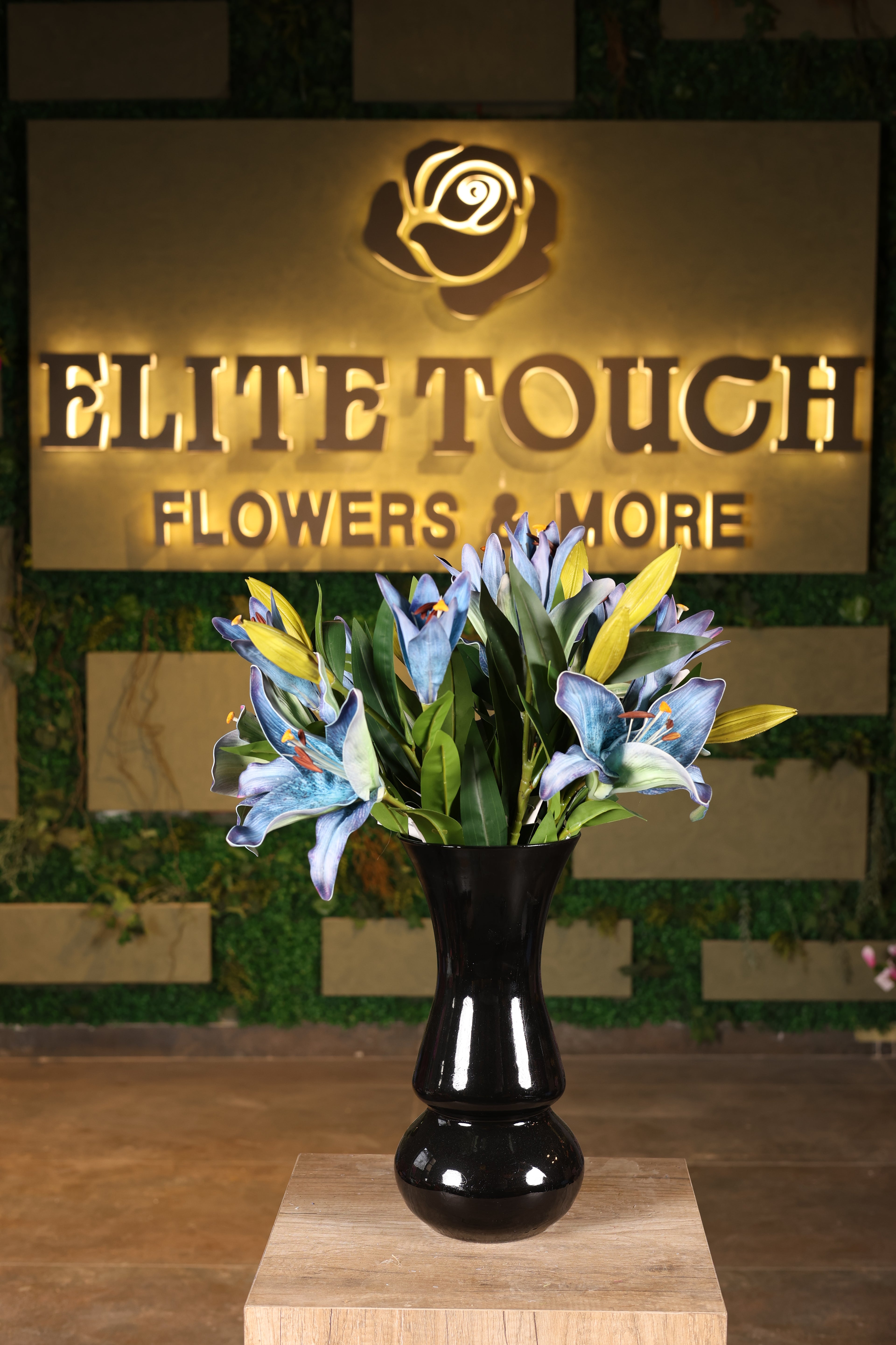 large artificial lilies in glass vase Egypt