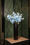 large artificial magnolia in glass vase Egypt