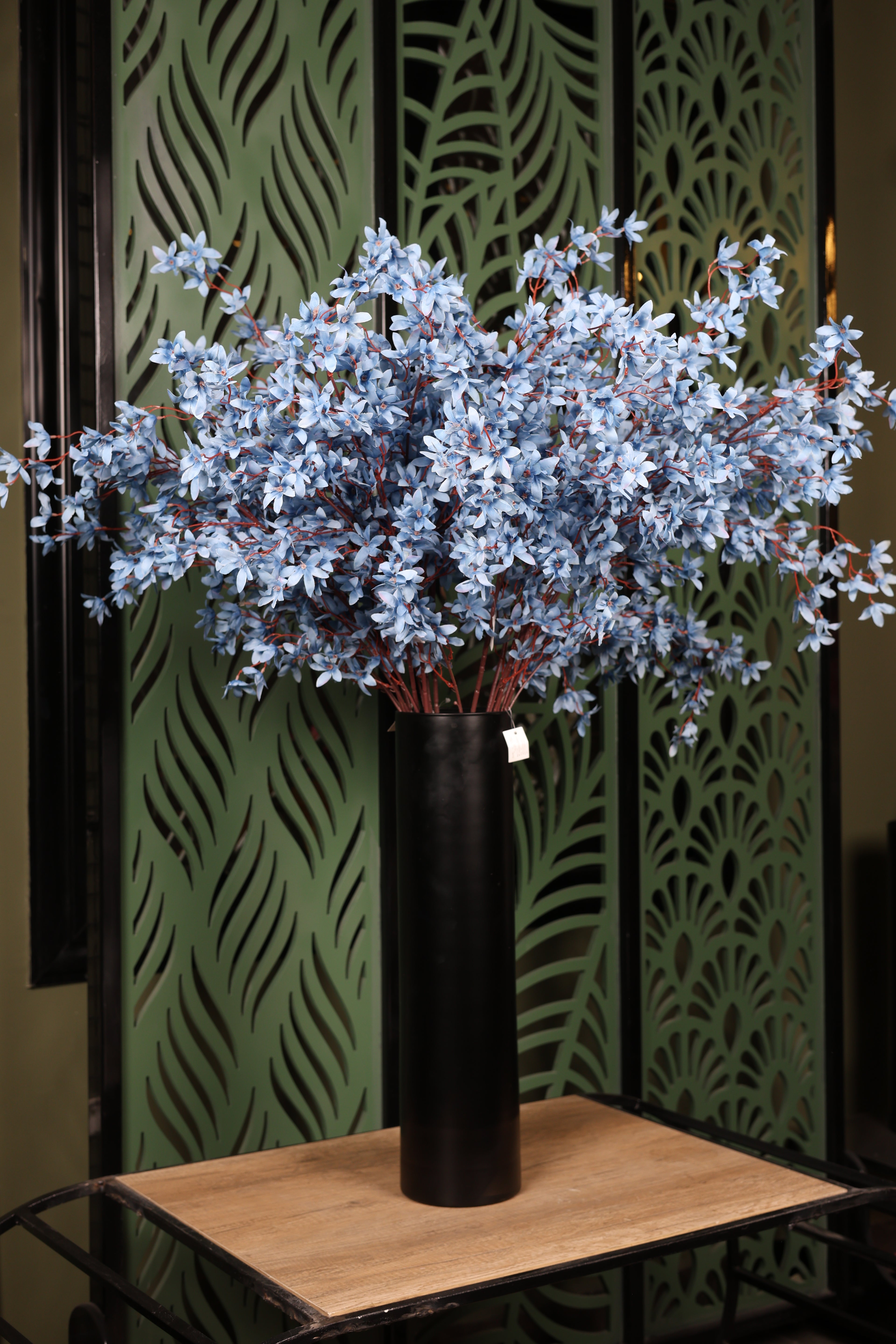 full mixed artificial flowers in glass vase Egypt
