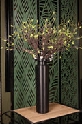 medium artificial green flower in glass vase Egypt