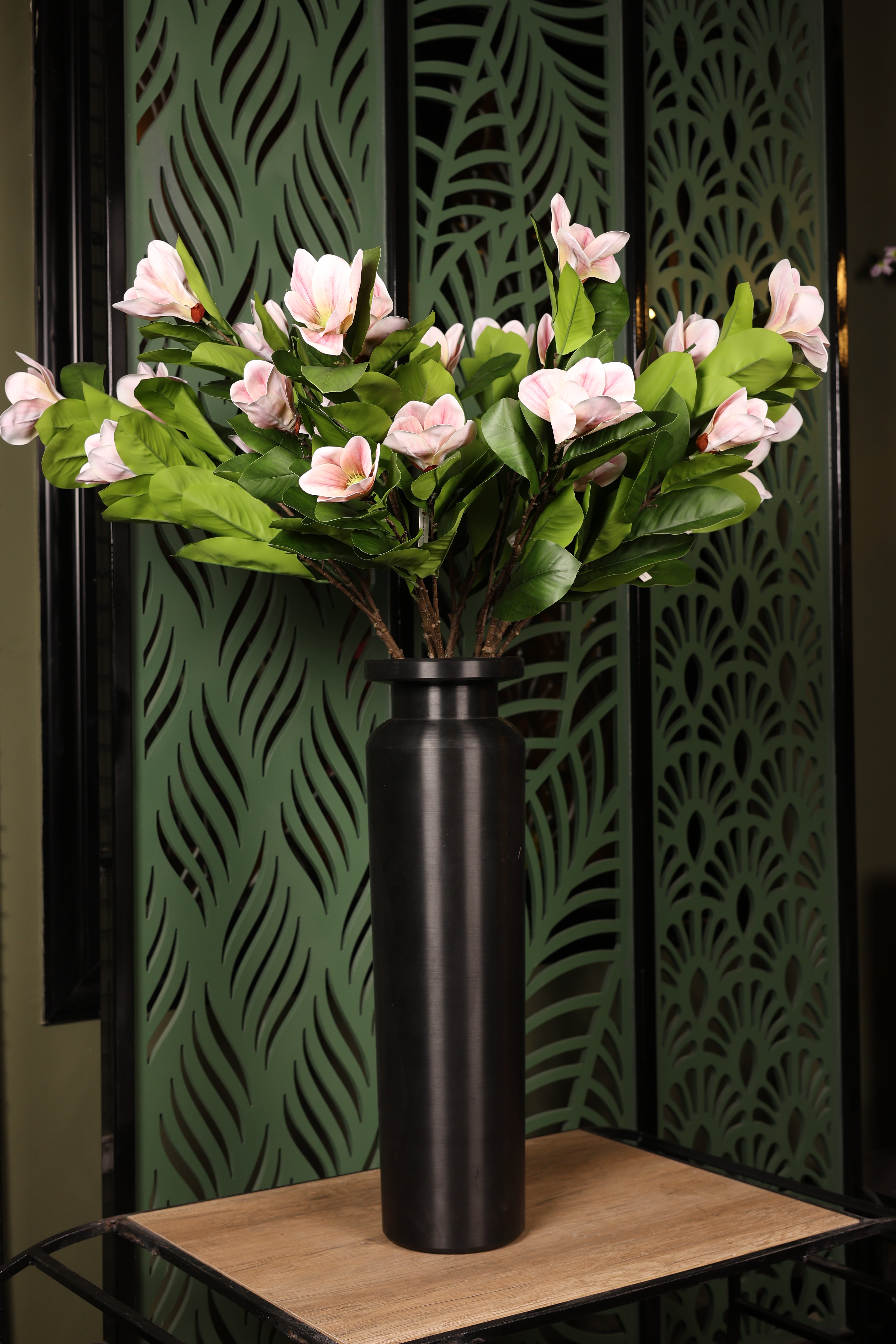 classic artificial magnolia in glass vase Egypt