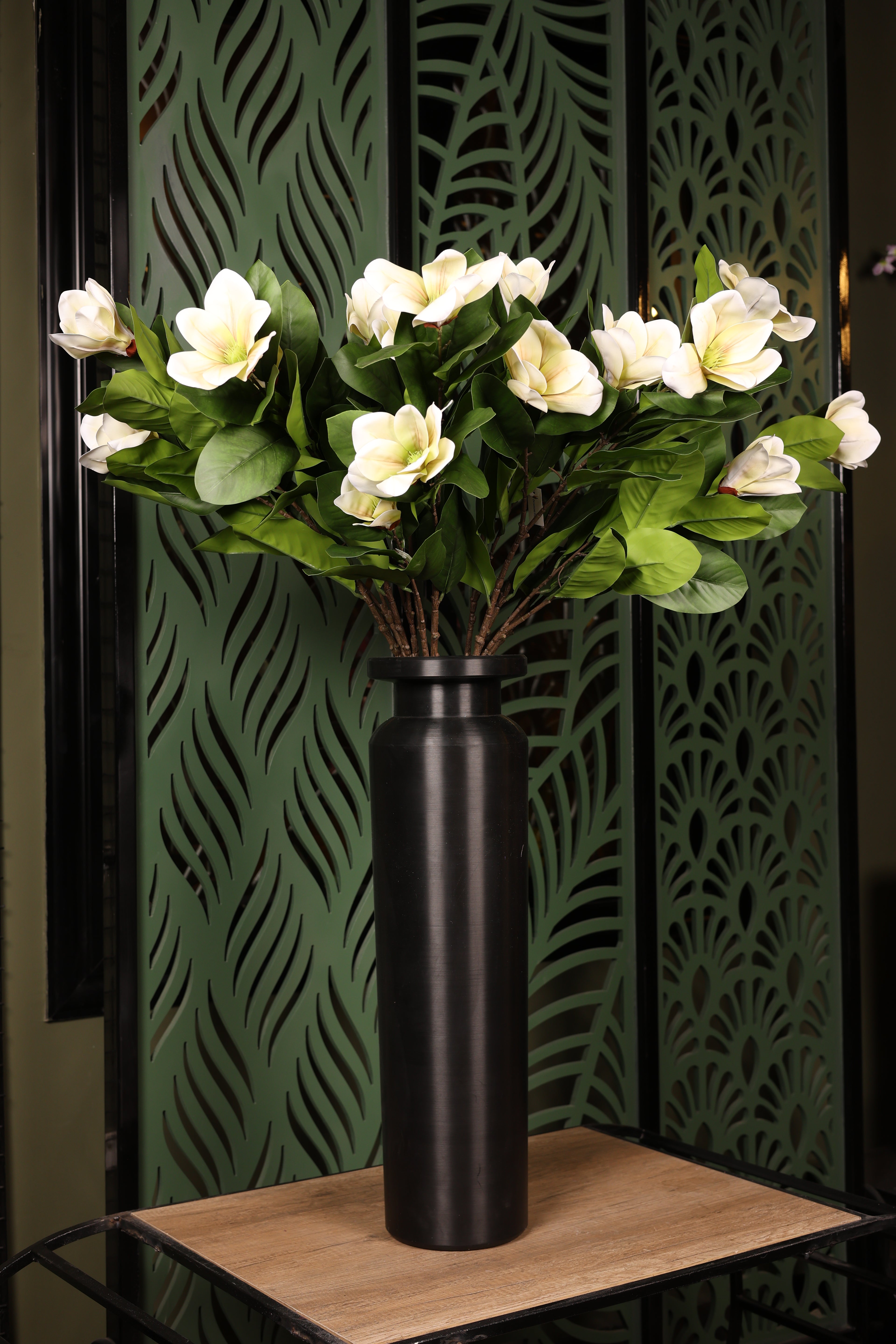 standard artificial magnolia in glass vase Egypt