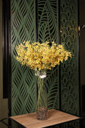 abundant full artificial flowers in glass vase Egypt