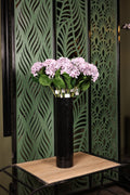 simple artificial Ortancia in glass vase Egypt