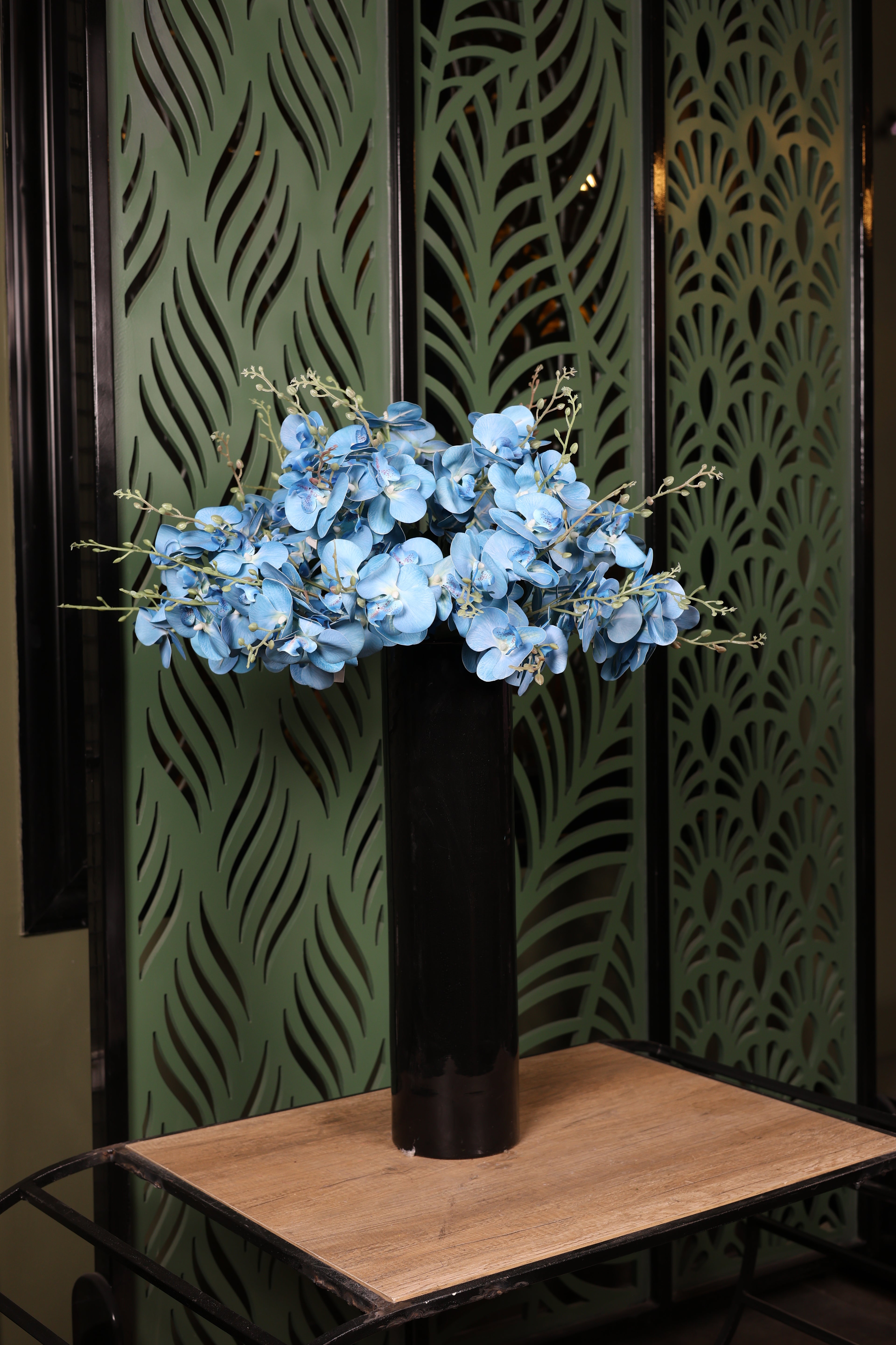 basic mixed artificial flowers in glass vase Egypt