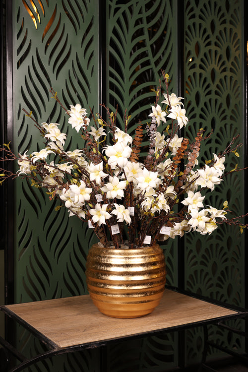 artificial baby orchid and dried flower in glass vase Egypt