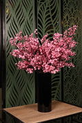 simple artificial jasmine in glass vase Egypt