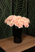 compact mixed artificial flowers in glass vase Egypt