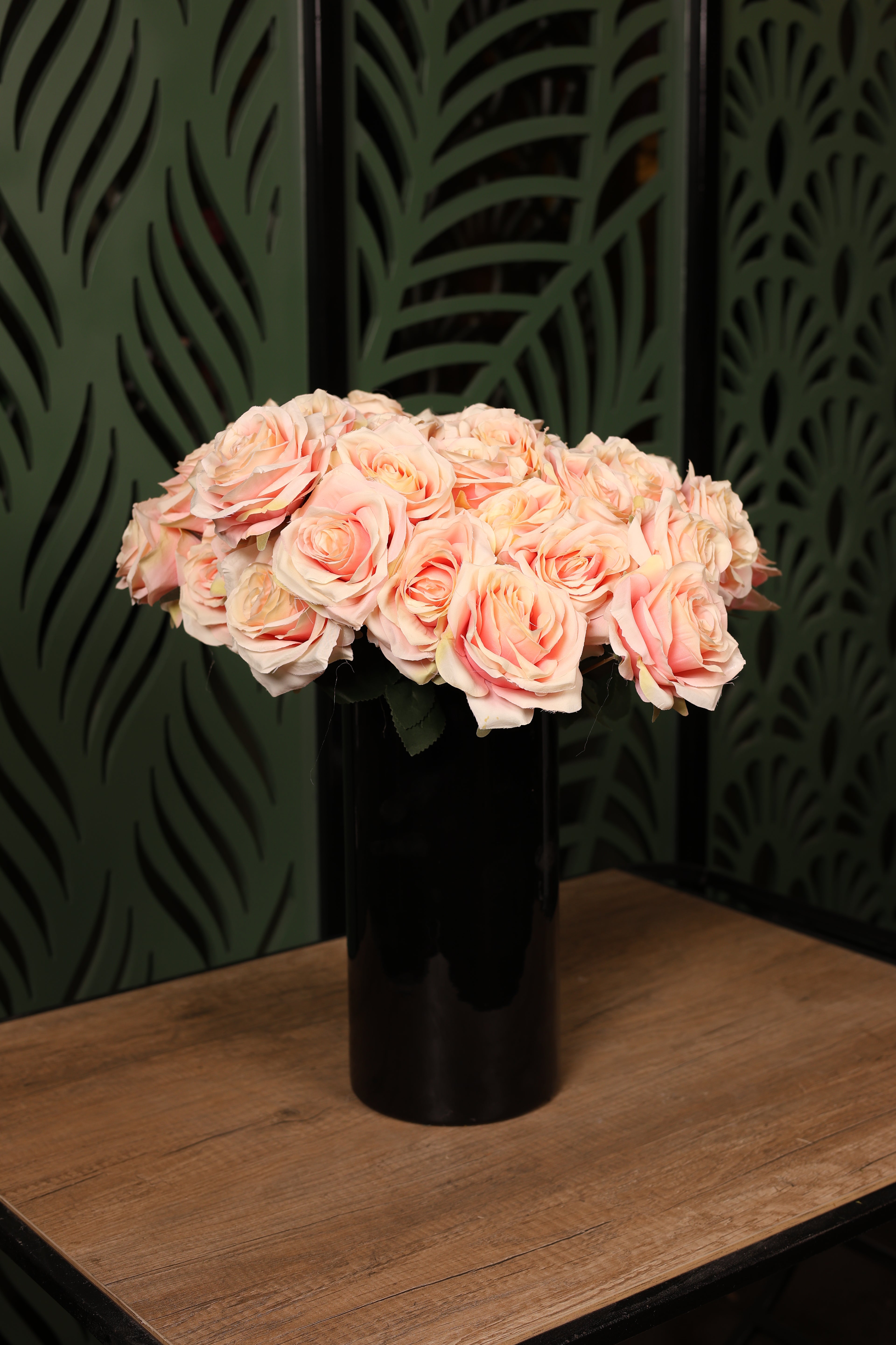 compact mixed artificial flowers in glass vase Egypt