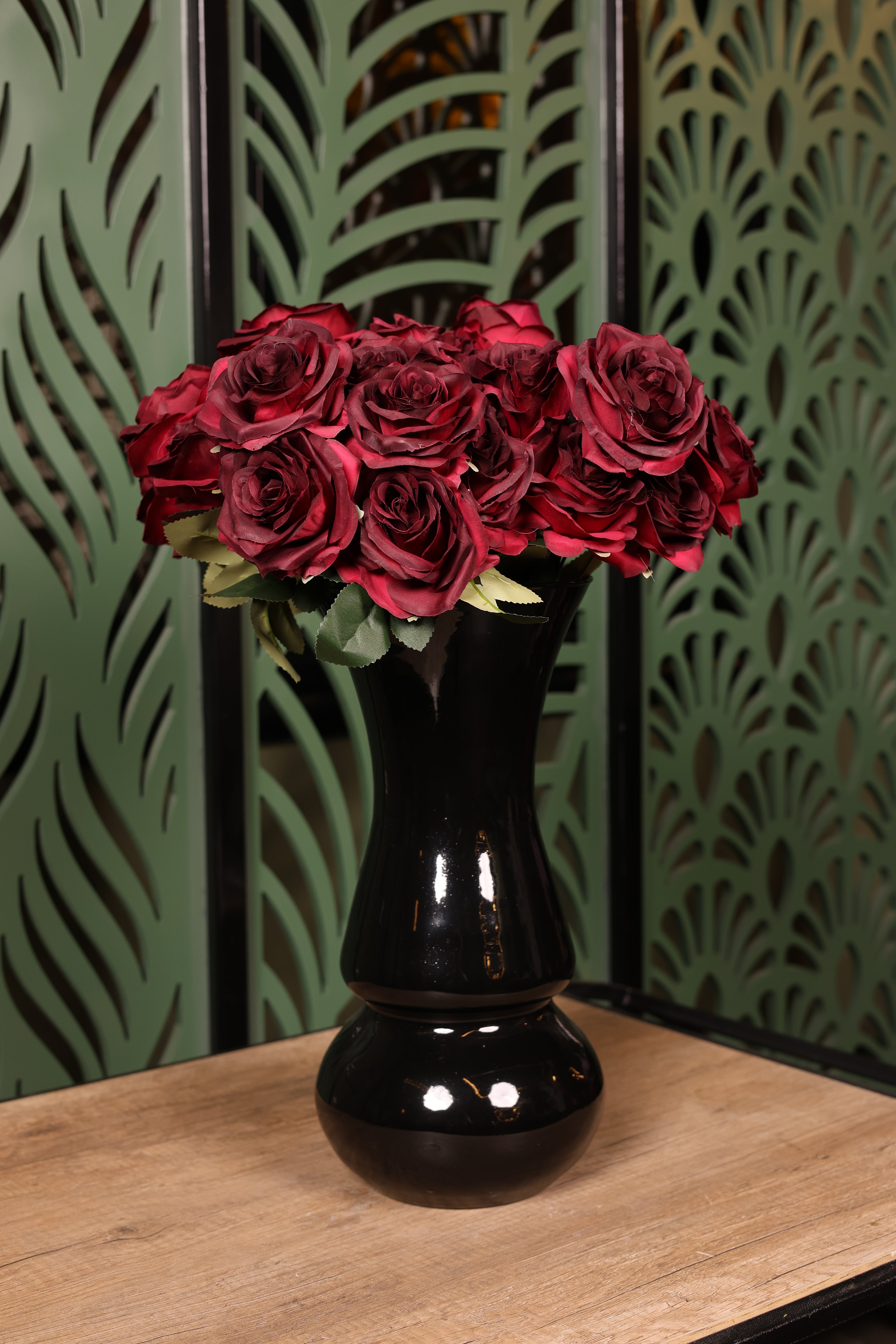 medium mixed artificial flowers in glass vase Egypt