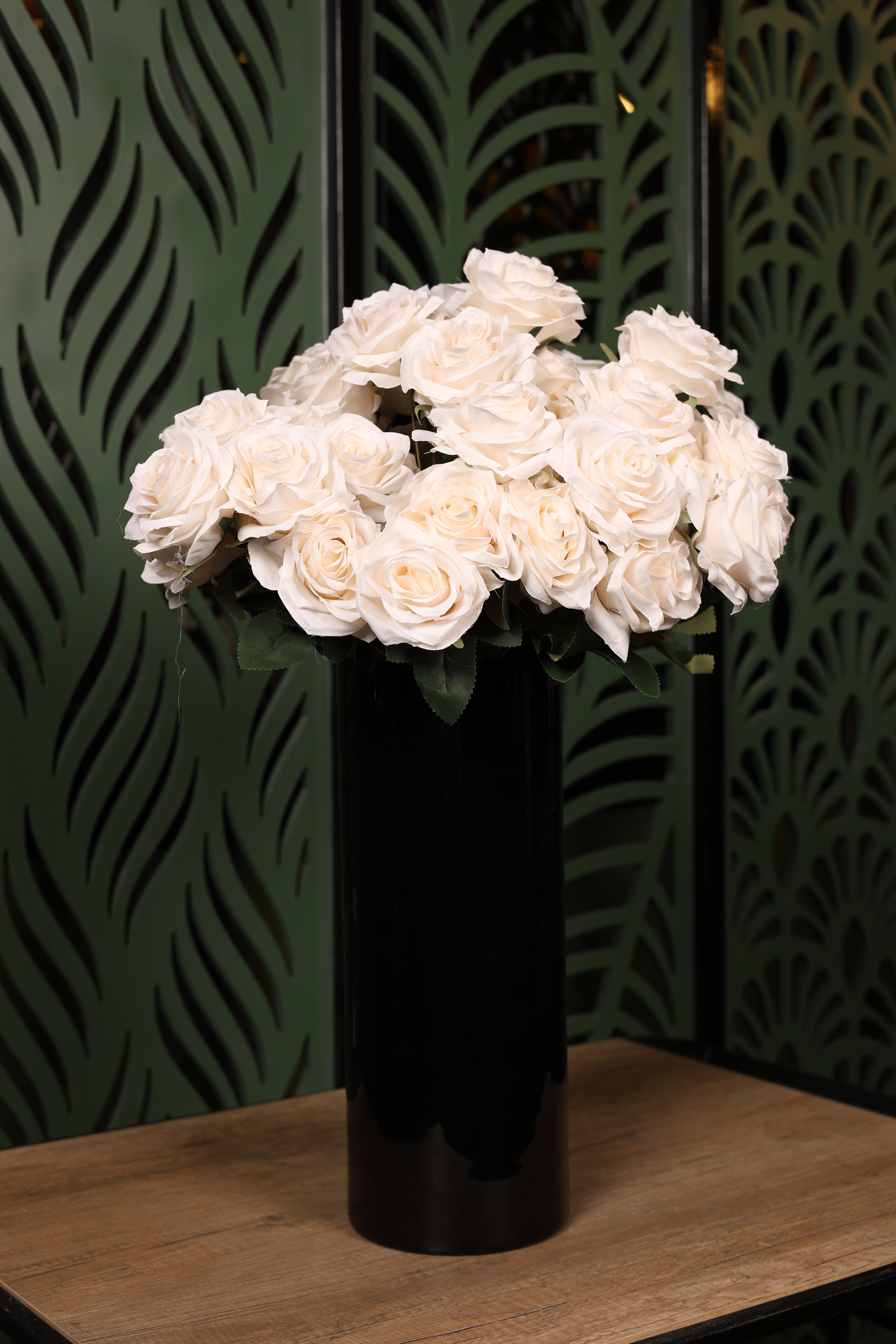 standard plus mixed artificial flowers in glass vase Egypt
