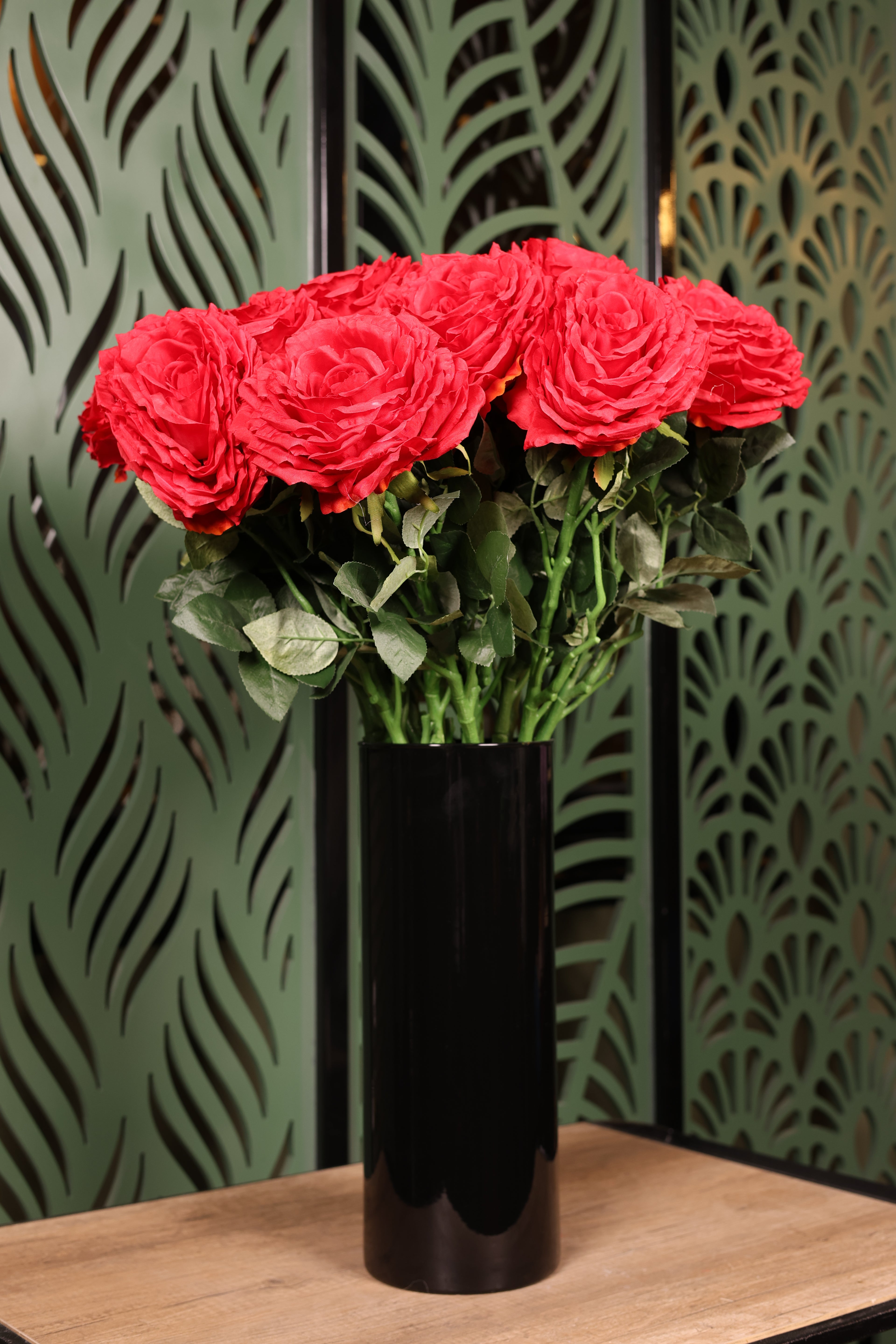 medium plus mixed artificial flowers in glass vase Egypt