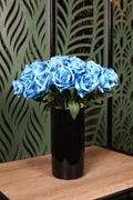 standard small mixed artificial flowers in glass vase Egypt