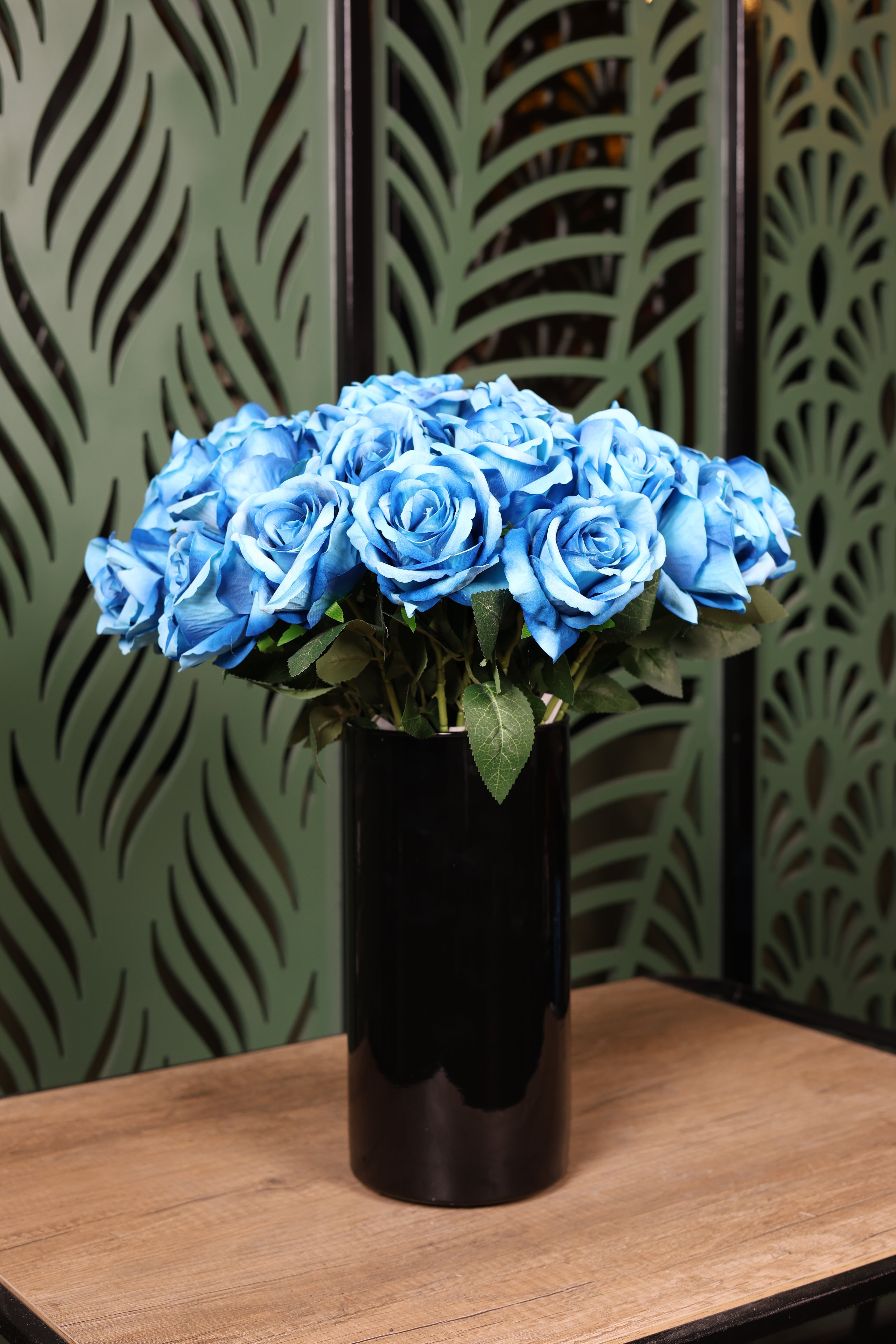 standard small mixed artificial flowers in glass vase Egypt