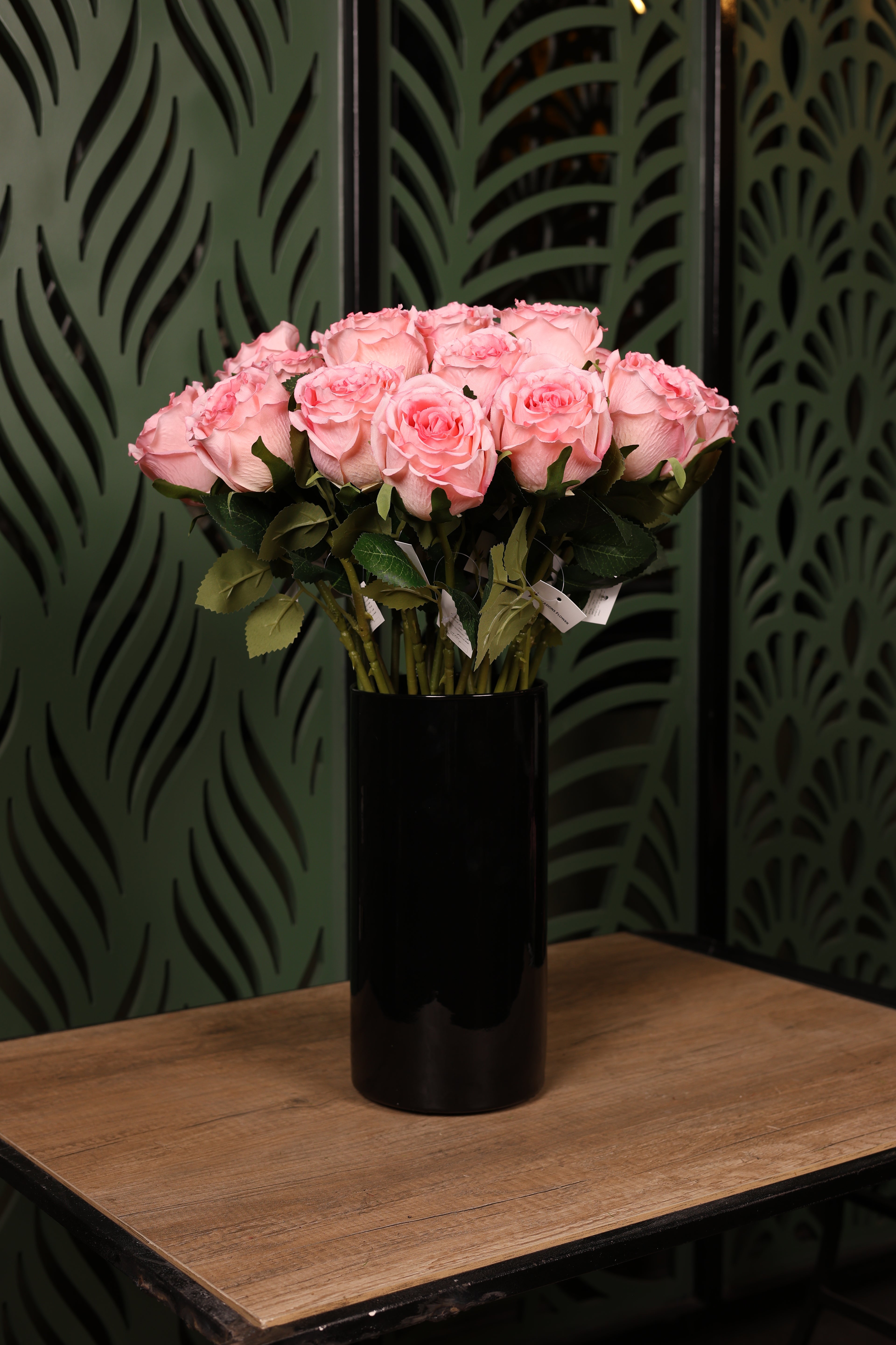 everyday mixed artificial flowers in glass vase Egypt